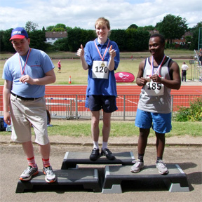 Oliver with his medal
