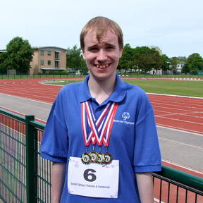 Oliver with his medals