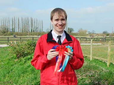Oliver with his prizes