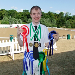 Oliver with his prizes
