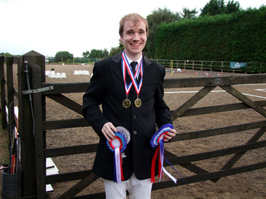 Oliver with his prizes