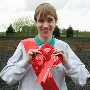 Oliver with his prizes