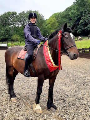 Oliver and Bailey with their Championship Show prizes