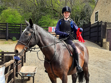 Oliver and Bailey with their prize rosettes