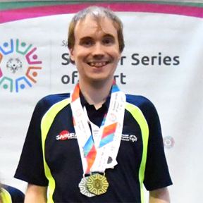 Oliver with his medals