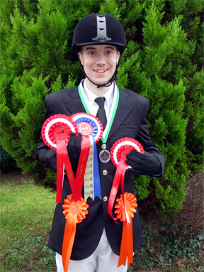 Oliver with his prizes