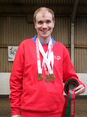 Oliver with his prizes