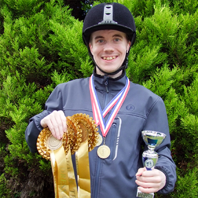 Oliver with his prizes