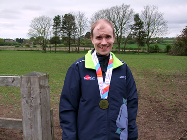 Oliver with his medal