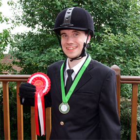 Oliver with his prizes