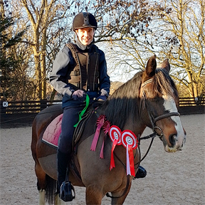 Oliver and BLS Santina with their prizes