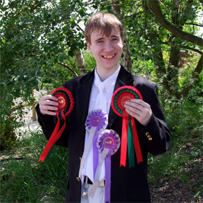 Oliver with his rosettes
