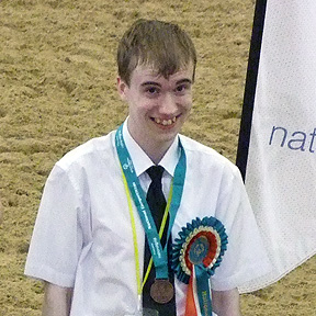 Oliver with his Dressage Bronze medal