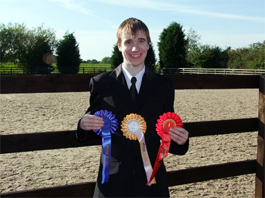 Oliver with his rosettes