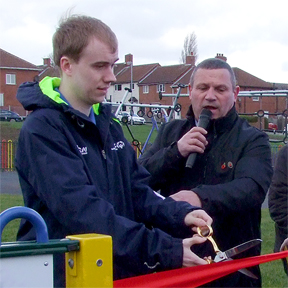 Oliver cuts the ribbon