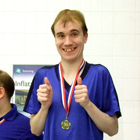Oliver, 25m breaststroke gold medallist