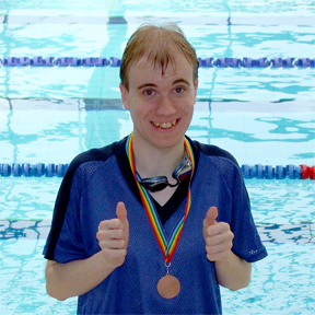 Oliver with his medal