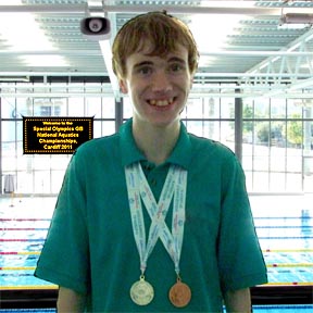 Oliver with his medals