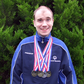 Oliver with his medals
