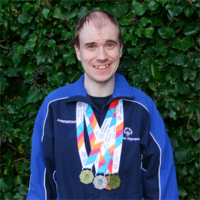 Oliver with his medals