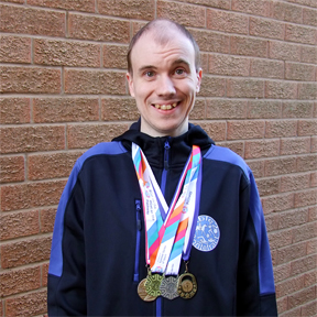 Oliver with his prizes