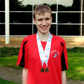 Oliver with his medals