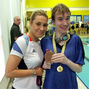 Oliver with GB Paralympic breaststroke medallist, Harriet Lee