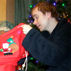 Opening presents on Christmas Day Opening presents on Christmas Day
